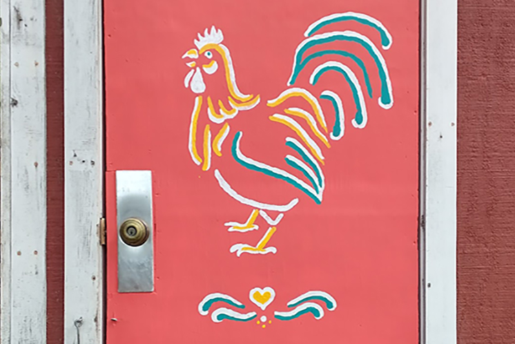 Chicken coop door painted with rooster by Laura Berlage